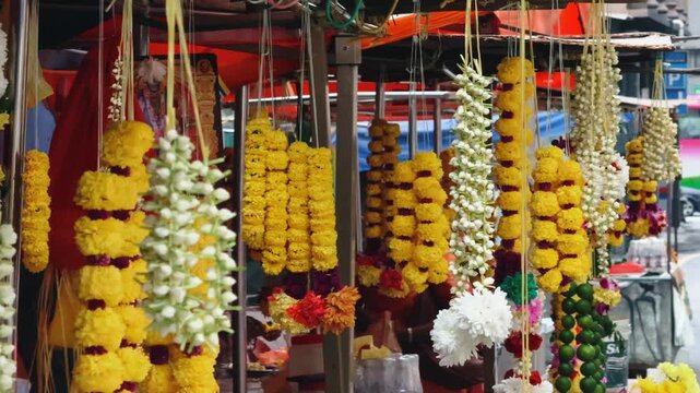 Close up of Traditional Indian Hindu Flower Garland Stall with Marigold and Jasmine