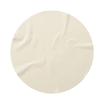 Round beige paper sticker with creased texture isolated on transparent background