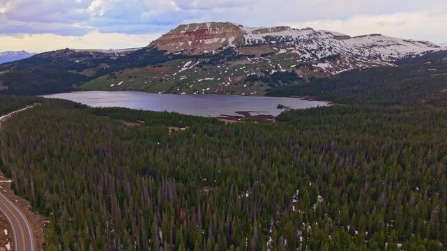 Scenic aerial view of Beartooth Lake with a rugged mountain range in the foreground in Wyoming