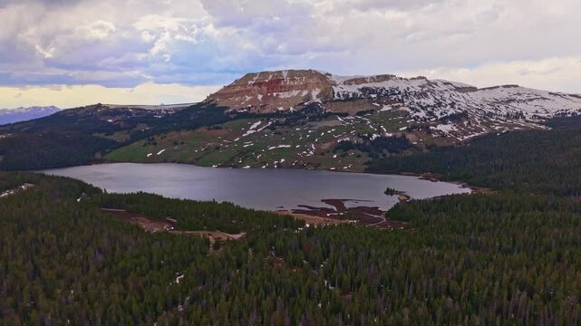 Scenic aerial view of Beartooth Lake with a rugged mountain range in the foreground in Wyoming