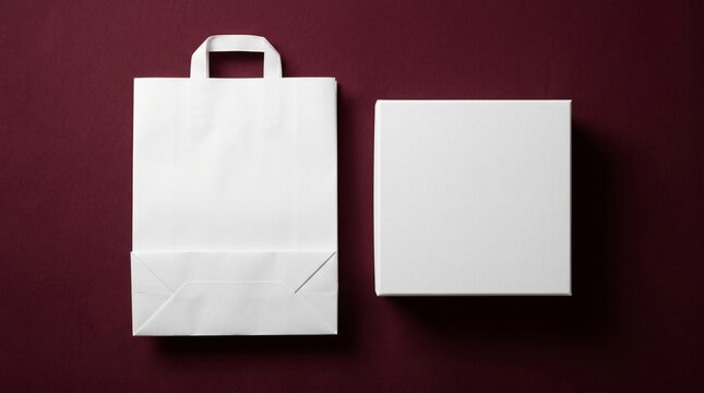 A top-down perspective shows a white paper bag and box on a maroon surface