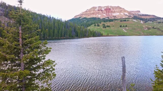 Scenic aerial view of Beartooth Lake with a rugged mountain range in the foreground in Wyoming
