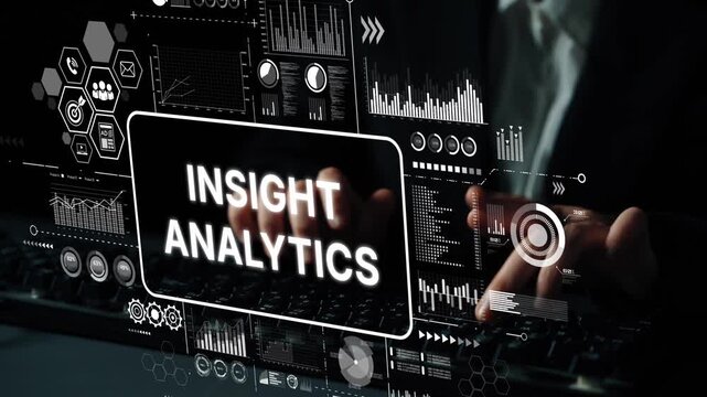 Person using computer with digital analytics and data visualization graphics for business insight analysis in modern workspace. Asymptotic smart data analytic.