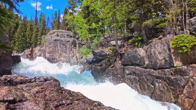 Scenic view of Lake Creek flowing through the mountains beside Beartooth Highway in Wyoming