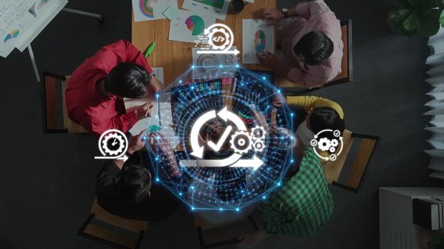 Aerial view of diverse professionals collaborating in a modern office, illustrating digital transformation and strategy planning through data analytics and technology visuals. Raster