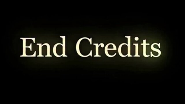 The words 'End Credits' displayed in a glowing, light-colored font against a dark, black background, signifying the conclusion of a film or video.