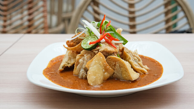 Batagor, made from fish or chicken dumpling, tofu, tapioca flour served with peanut sauce. Indonesian food