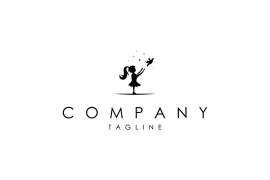 Vector logo on which an abstract image of a silhouette of a girl releasing a bird on the background of stars.