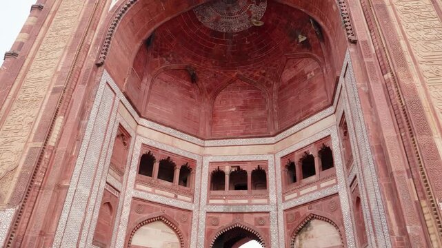 Intricate Red Sandstone buland darwaza Archway Showcasing Mughal Architectural Craftsmanship