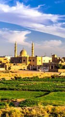 Obraz premium A vertical composition showcases a mosque amidst a cityscape, with a sky overhead. A verdant field provides foreground interest