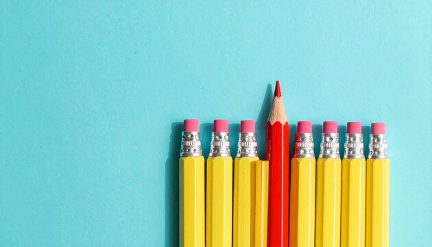 Nine pencils with one red standout