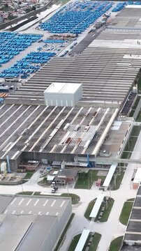 Industrial Data center in Santa Catarina, Brazil. Aerial view in vertical video. Production of porcelain tiles and large format porcelain slabs.