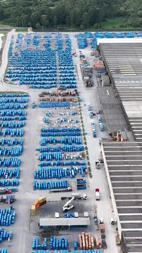Industrial Data center in Santa Catarina, Brazil. Aerial view in vertical video. Production of porcelain tiles and large format porcelain slabs.