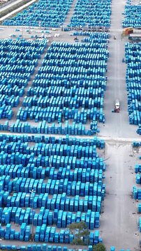 Industrial Data center in Santa Catarina, Brazil. Aerial view in vertical video. Production of porcelain tiles and large format porcelain slabs.