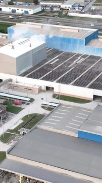 Industrial Data center in Santa Catarina, Brazil. Aerial view in vertical video. Production of porcelain tiles and large format porcelain slabs.