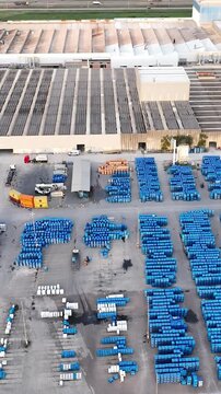 Industrial Data center in Santa Catarina, Brazil. Aerial view in vertical video. Production of porcelain tiles and large format porcelain slabs.
