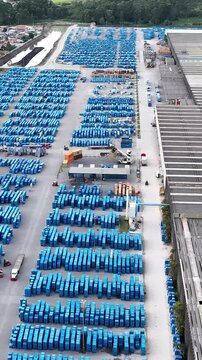 Industrial Data center in Santa Catarina, Brazil. Aerial view in vertical video. Production of porcelain tiles and large format porcelain slabs.