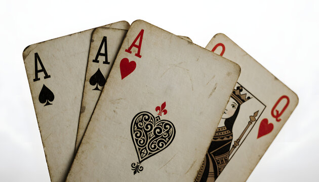 Fanned Vintage Playing Cards with Hearts and Spades Close Up on White Background