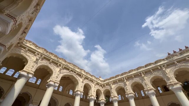 Decorative stone pillars and ornate architectural details inside Thirumalai Nayakkar Palace in Madurai, Tamil Nadu, India, showcasing the grandeur and craftsmanship of Nayak dynasty heritage