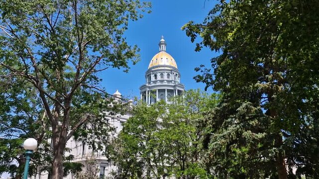 Colorado State Capitol Building Dome on Sunny Day, Denver USA, Historic Landmark Behind Trees