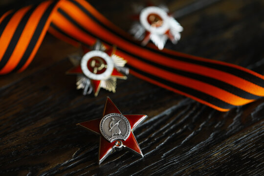 Patriotic War Order and battle order for courage and bravery on George Ribbon background for the great day of Victory (russian text: Patriotic War)
