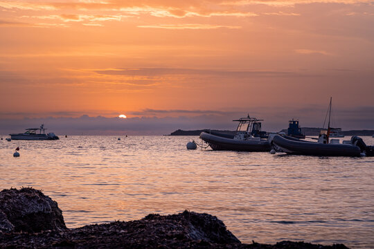 Boats mooring at sunset in Piantarella, Bonifacio