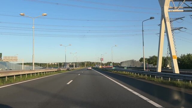 Amsterdam Netherlands highway, Modern urban highway with overhead signs and light traffic