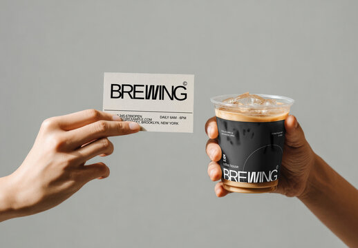 Hand Holding Iced Coffee And Business Card