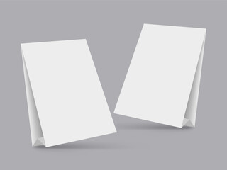 Fototapeta premium White folding table card. Table tent mockup. For use in restaurants, bars, and cafes to promote products or menus. Vector illustration
