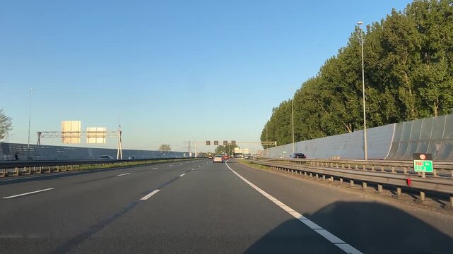 Amsterdam Netherlands highway, Curving urban motorway leading toward the city