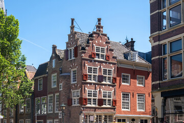 Naklejka premium Ornate Delft City Hall facade under blue sky in Delft city centre, Netherlands