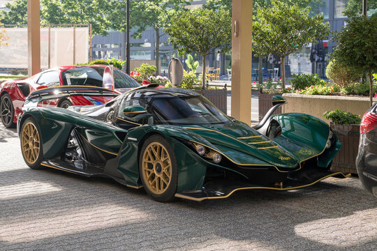 Luxembourg City, Luxembourg - June 22nd 2026 : View on a green Praga Bohema finished in Moldavite Green parked on a street with v&eacute;g&eacute;tation in the background.