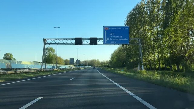 Amsterdam Netherlands highway, Sunny Dutch motorway approaching a modern junction
