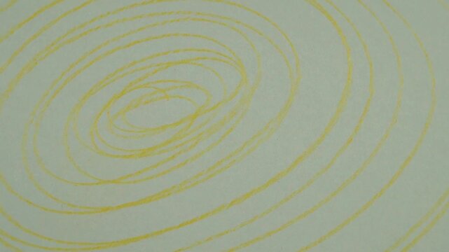 Rotation of scribbles on a green paper