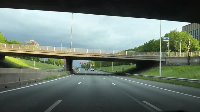 Amsterdam Netherlands highway, Urban highway curving under an overpass