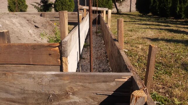 wooden formwork for the foundation of a house