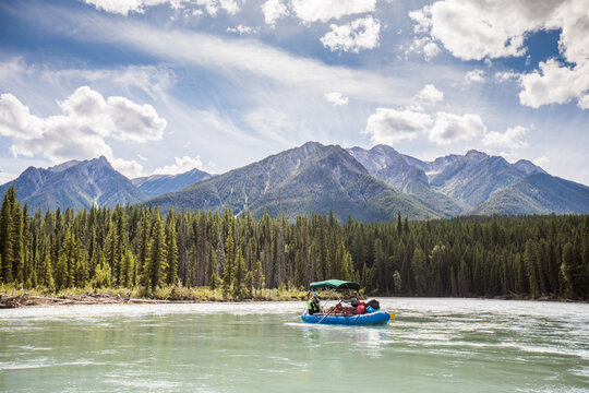 Scenic river rafting adventure with mountain views