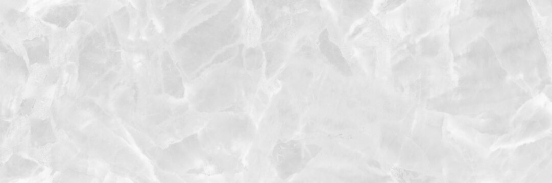 Soft grey marble texture background with translucent crystal patterns and delicate natural stone details. Elegant pastel mineral surface featuring organic shapes and a calming abstract aesthetic.