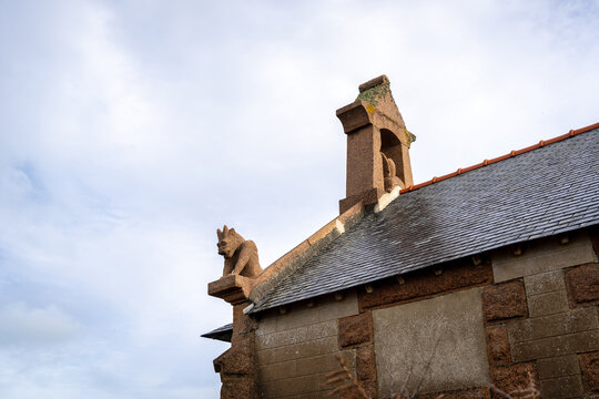 Gargoyle of Chapelle du Diable - Devil Chapel -  overlooking Tregastel coast, Brittany, France