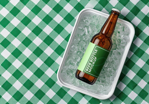Beer Bottle Mockup On Ice With Green Checkered Background PSD