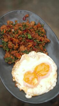 Krapow Moo Sab Prik Haeng Kai Dao, Thai stir-fried minced pork with dried chili and holy basil.