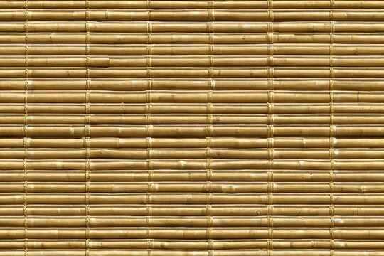 Khaki yellow horizontal thin bamboo cane mat texture background