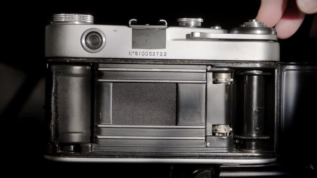 Operating process of focal plane shutter mechanism retro analog film photo camera close-up