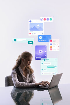 Businesswoman creating social media content with digital communication app interface. Concept of digital marketing, content creation, online communication, and SaaS platforms.