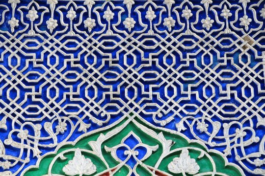 An example of traditional Uzbek wall decoration art. A relief made of plaster with plant and geometric motifs. Tashkent, Uzbekistan.