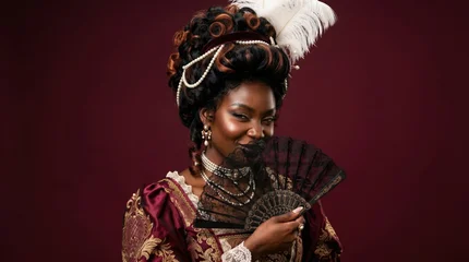 Dark skinned woman in a rich maroon dress with gold details holds a decorative fan, her elaborate hairstyle adorned with pearls and feathers. Perfect for royal, elegant themes. © AnnaPa