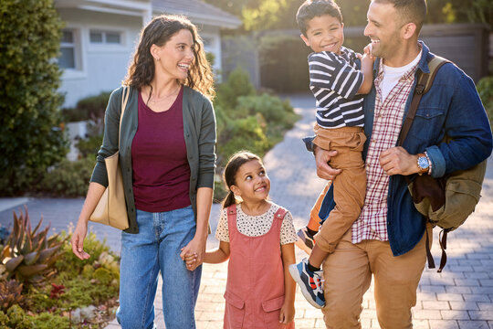 Happy multiethnic family walking outdoor