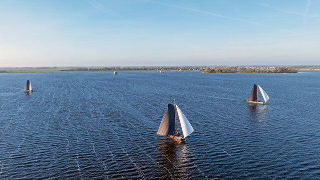 Traditional sailing vessels on the Heegermeer in Friesland the Netherlands