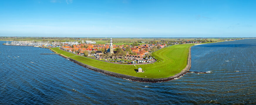 Panoramic view of a historic lakeside town in Europe