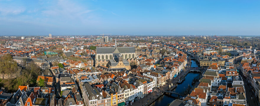 Historic canal city Leiden with prominent church tower in the Netherlands